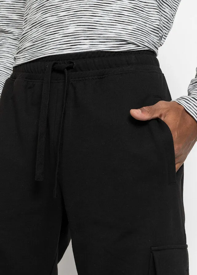 Pantalón de chándal con bolsillos tipo cargo y corte holgado Negro