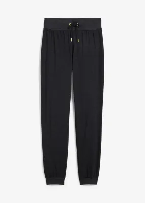 Pantalón de chándal con puños negro amarillo neón moteado